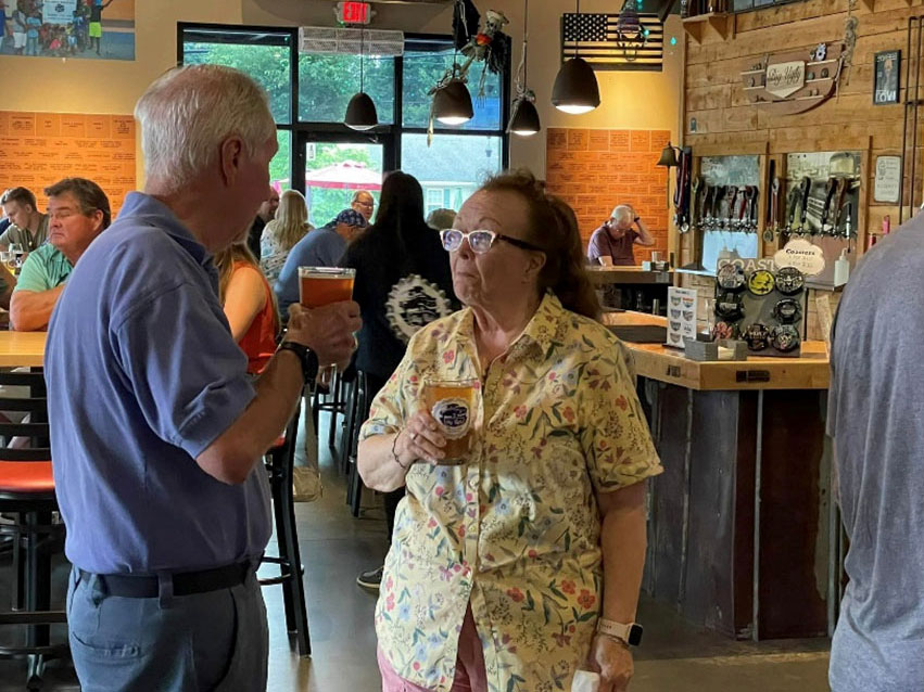 CVC Restoration Manager Dave Koubsky catching up with former Board Chair Diana Bailey.