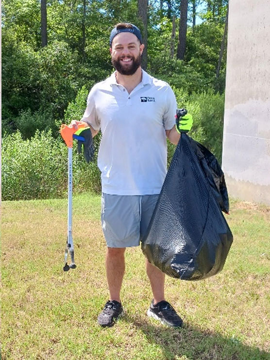 HRRA member, Cole Nebb, working hard to leave Newton Neck park clean and green.